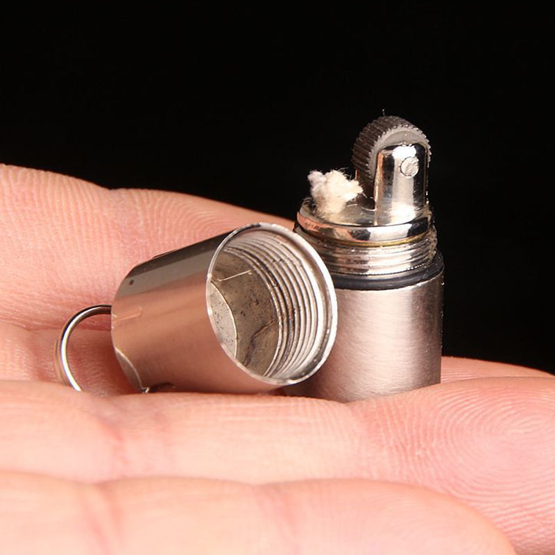 Mini Keychain Gasoline Lighter attached to a set of keys for scale