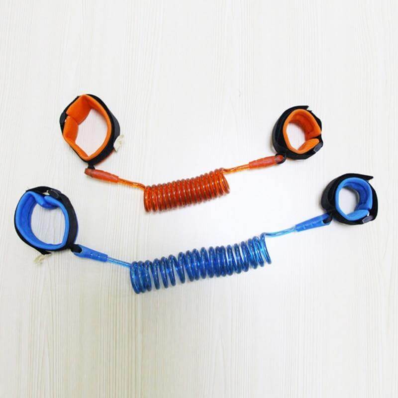 A child wearing the secure blue anti-lost wristband