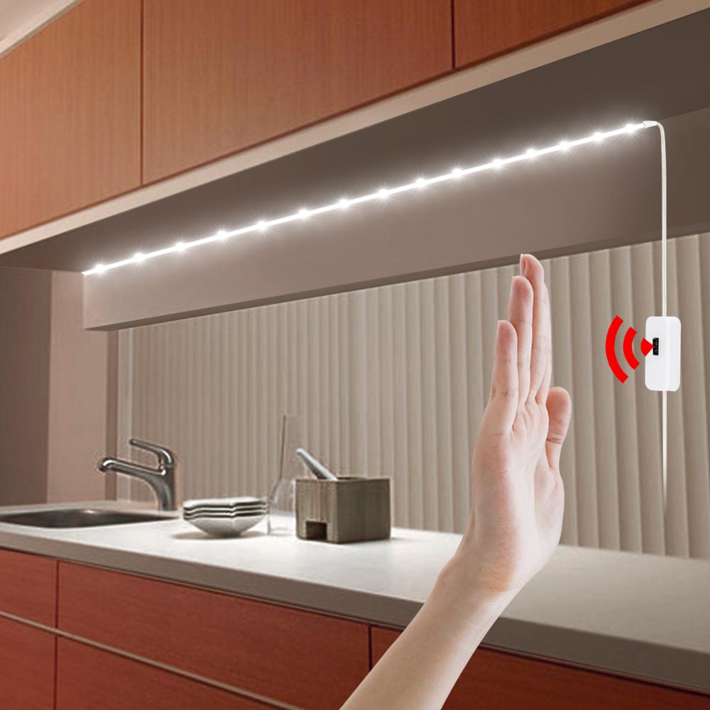 Hand waving to activate the motion sensor kitchen LED night light