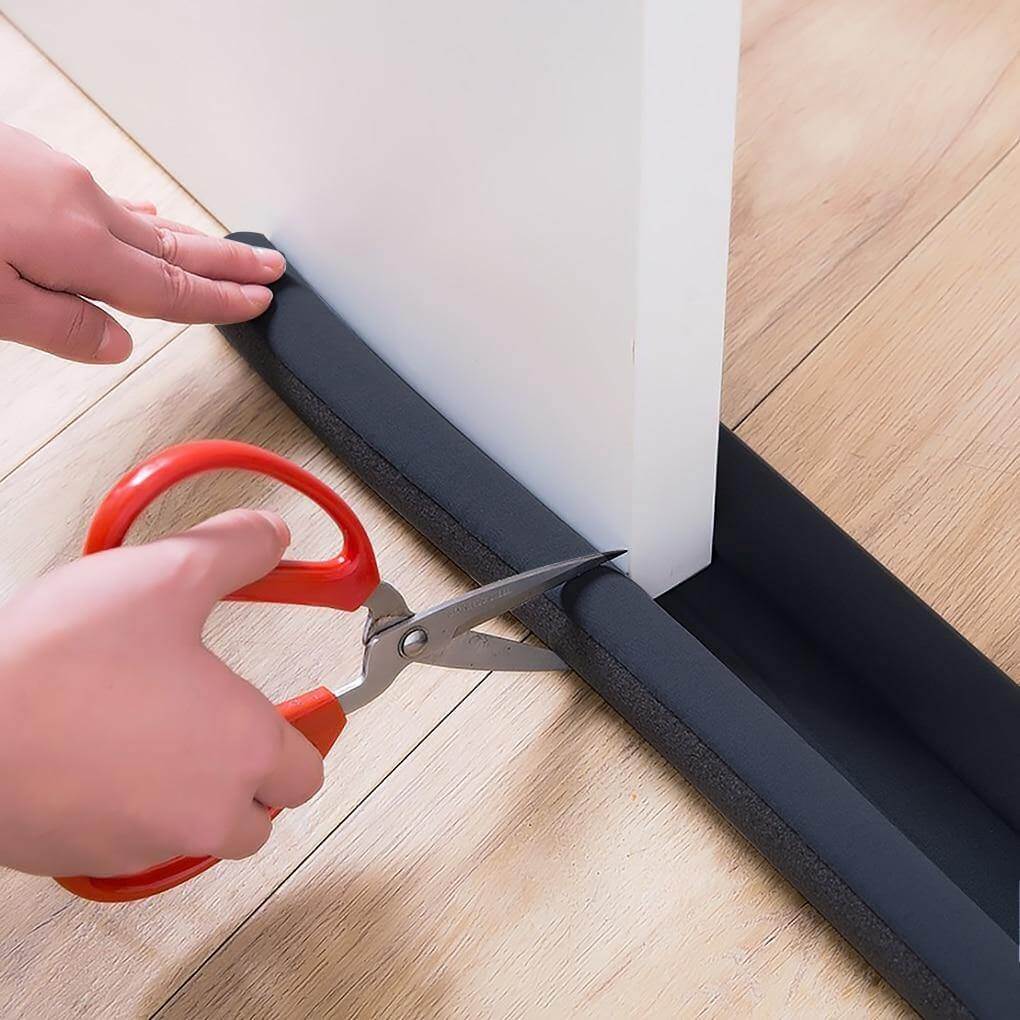 A sound proof door strip installed on a wooden door