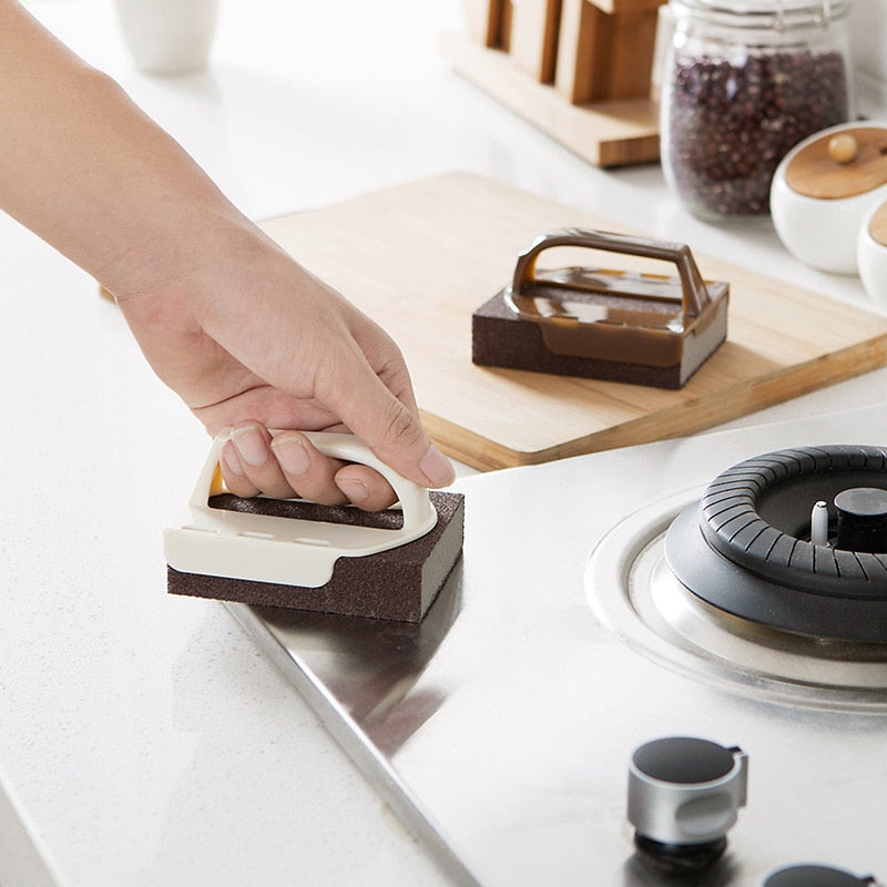 The Nano Heavy Duty Rust Remover Brush cleaning a stainless steel sink