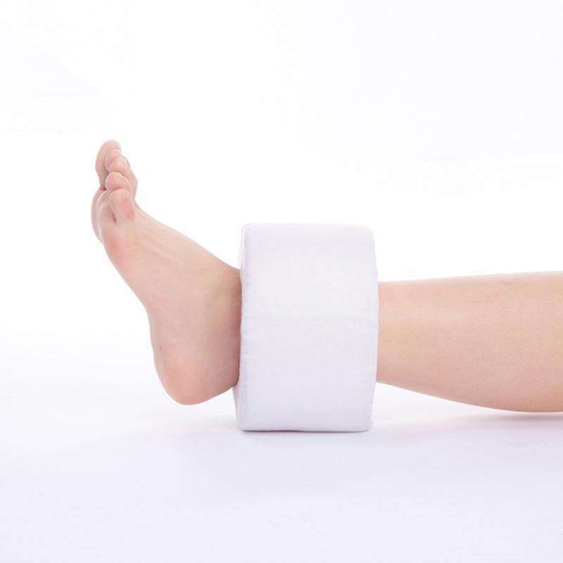 Close-up of the foot elevation pillow showing its 360-degree design