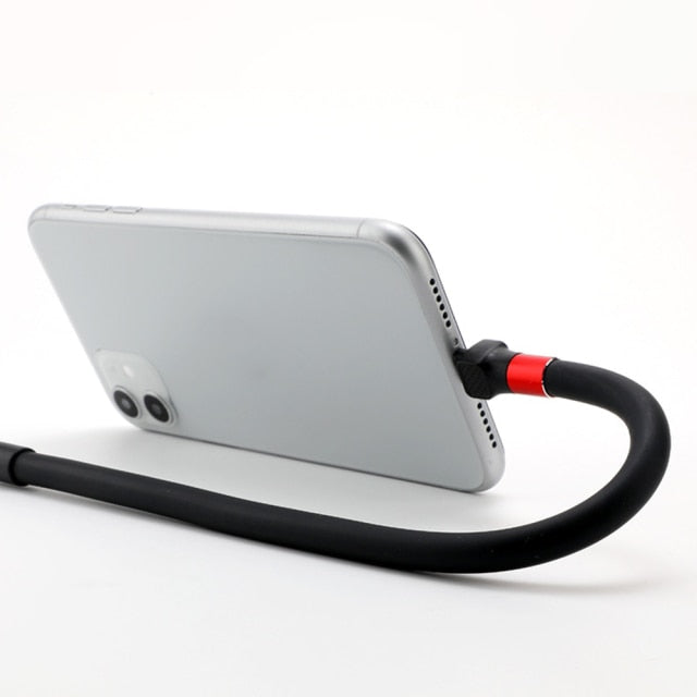 A person using the lazy charging cable to hold their phone during a video call in a cafe