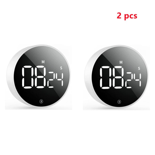 The back of the timer showing the magnetic surface and battery compartment