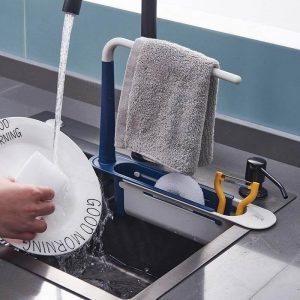 Versatile sink caddy with folding drain rack for sponges and brushes