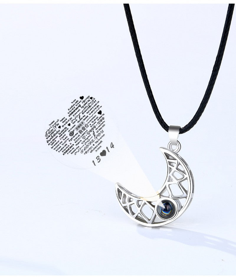 A model wearing the sun pendant from the 100 Languages I Love You Projection Couple Necklace set
