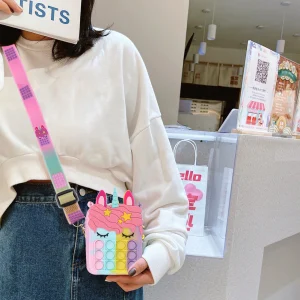Colorful pop-it bubble silicone pouch, acting as a fidget toy and carrying essential