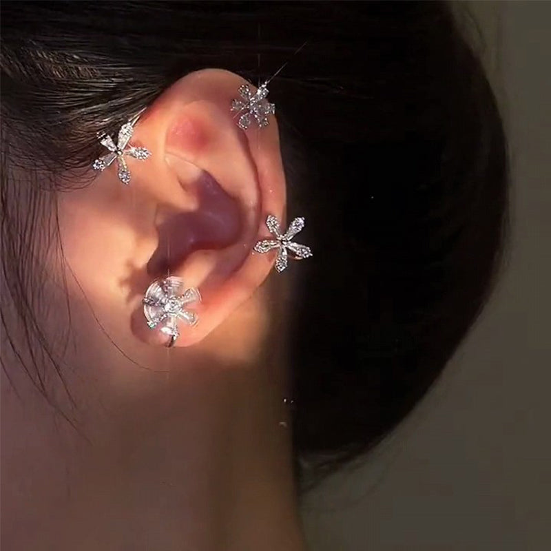 Elegant rotating windmill zircon sparkling earring on display