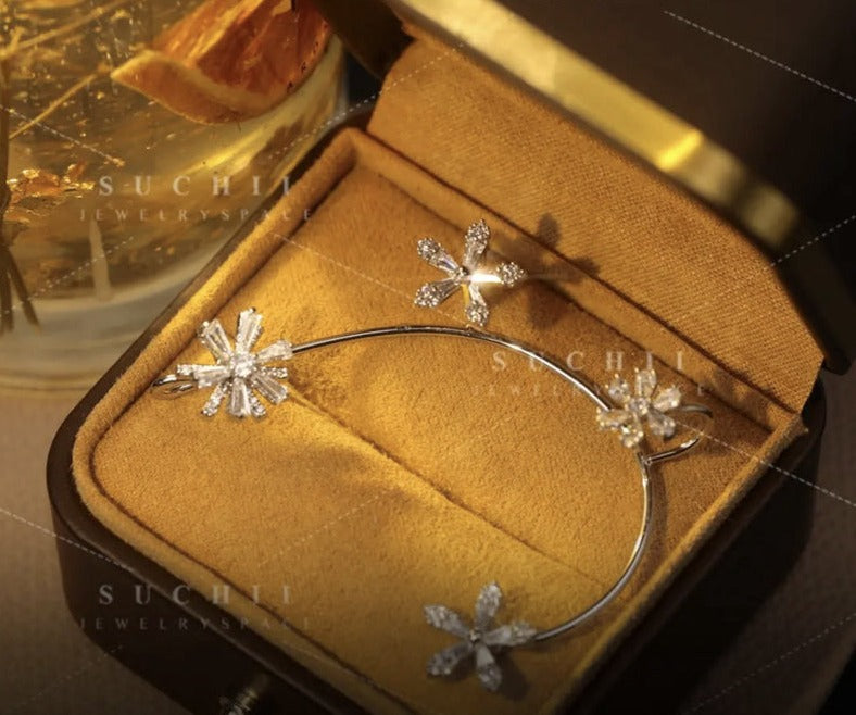 Woman wearing the elegant rotating windmill earrings