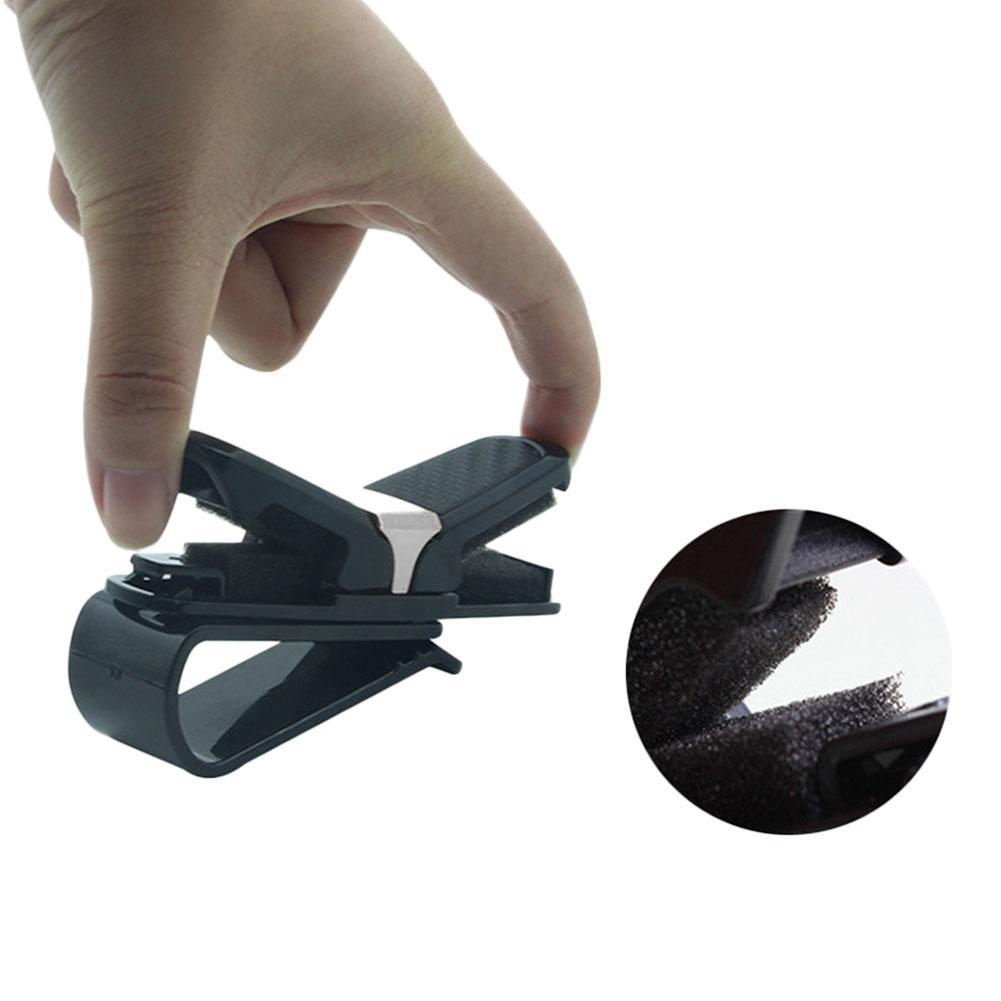 Demonstration of the dual clip holding both glasses and a card