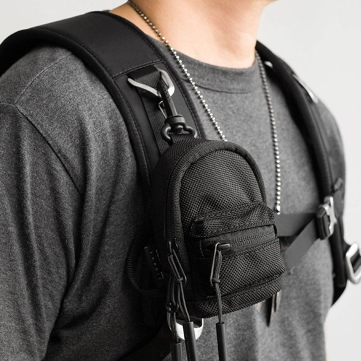 A person holding the Japanese Style Mini Backpack Coin Purse