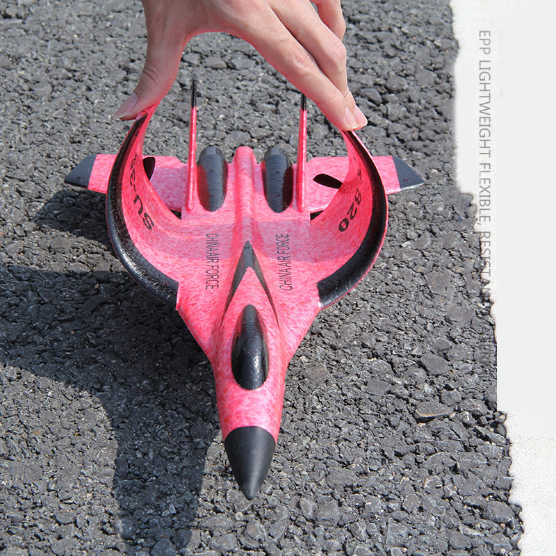 Detailed view of the Remote Control Foam Fighter Airplane's components and remote
