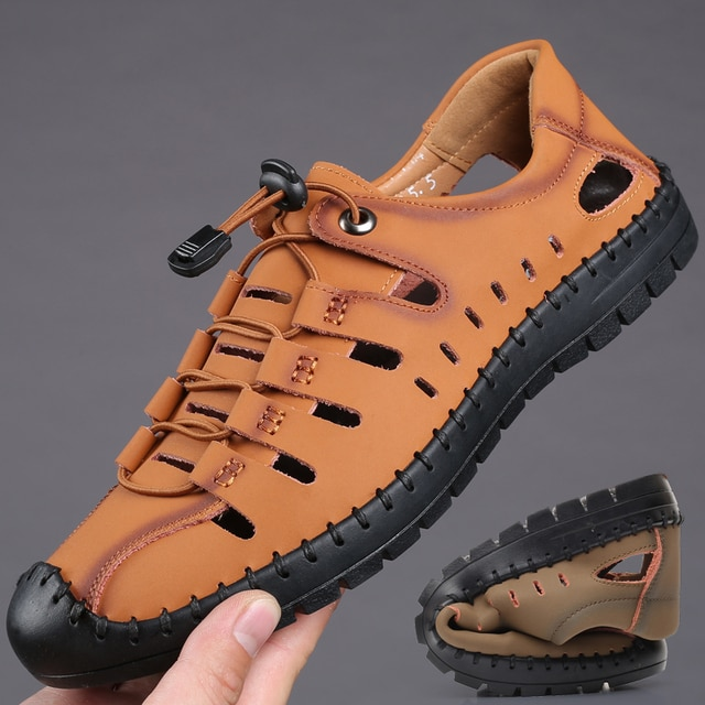 Close-up of a brown leather flexible beach sandal, perfect for summer comfort