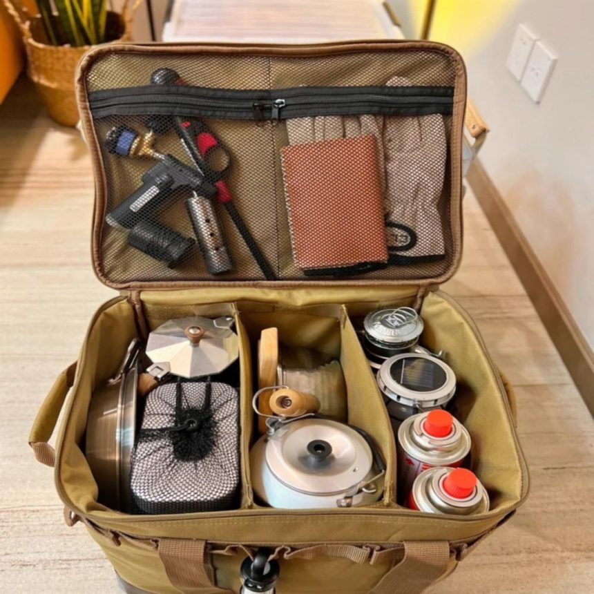 Compact olive green multi-pocket storage bag perfect for camping and outdoor adventures.