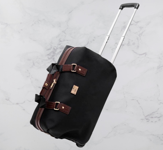 Professional black rolling caddy bag, designed for business travel with elegant styling and functional compartments