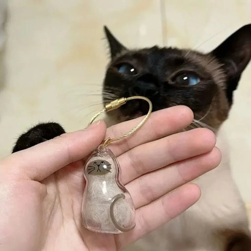 Close-up of the keepsake pendant's opening for cat fur
