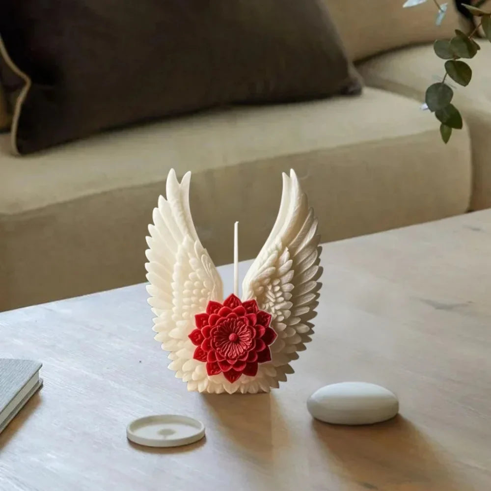 Close-up of the elegant angel wings on the candle holder