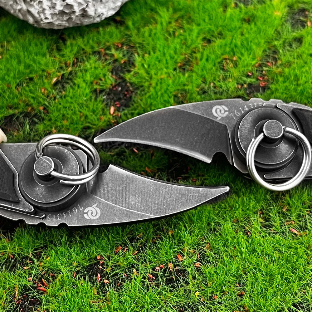 Compact Tactical Claw Knife EDC Pocket Blade held in hand