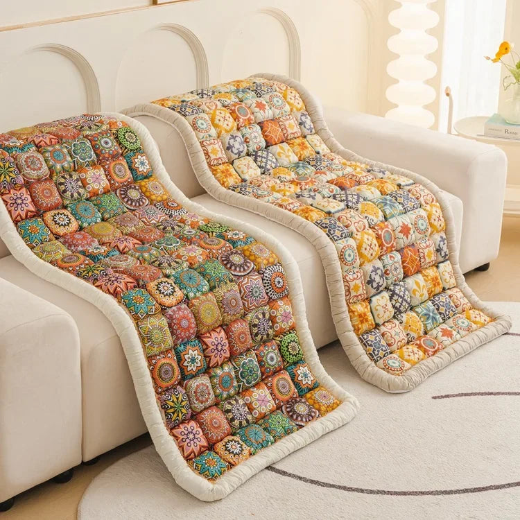 Close-up of the intricate woven patterns on the boho couch pad