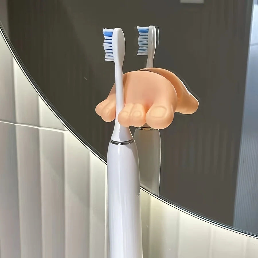 A single Toe-Grip holder demonstrating its secure grip on a toothbrush