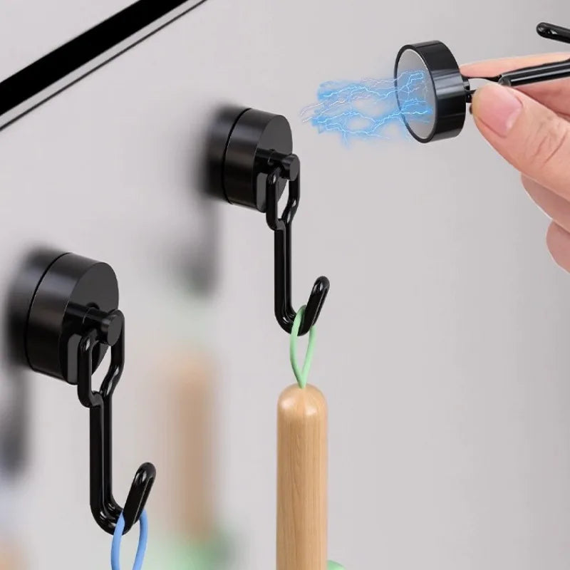 Magnetic wall hook used in a kitchen to hang utensils