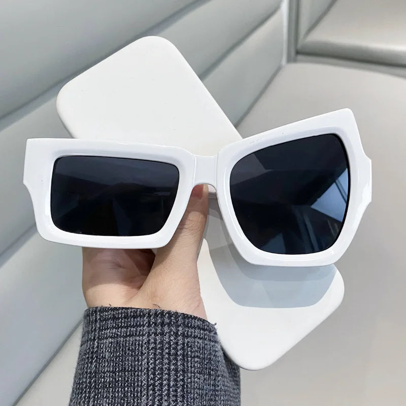 Side profile of a person wearing the sleek and modern Bold Eye sunglasses