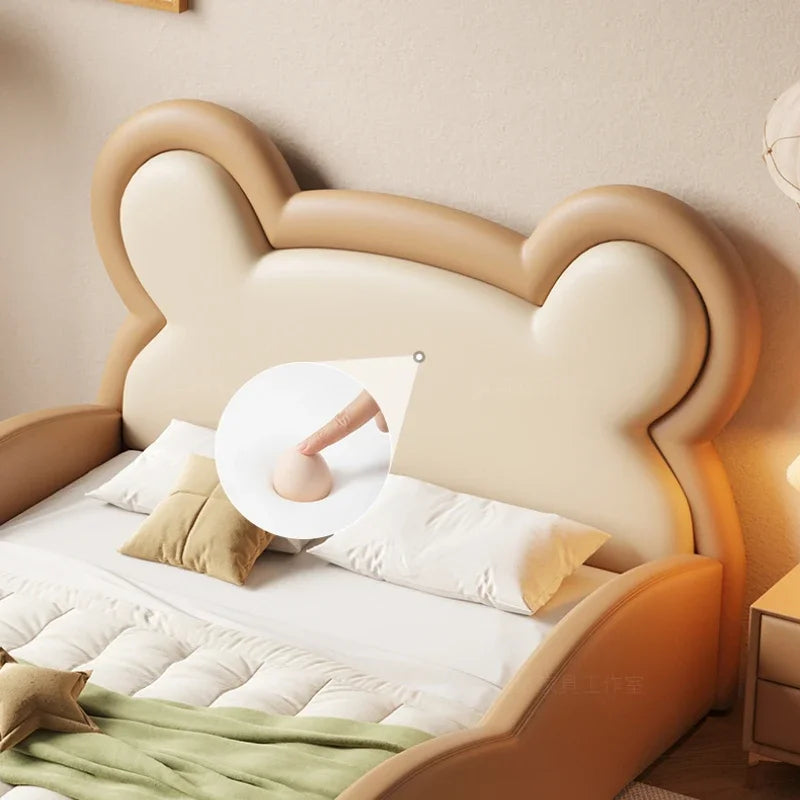 Close-up of the comfy bear headboard on the kids' bed