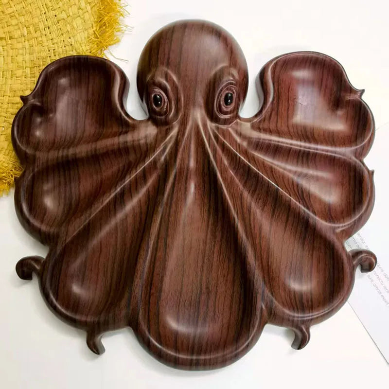 A person holding the lightweight octopus serving platter