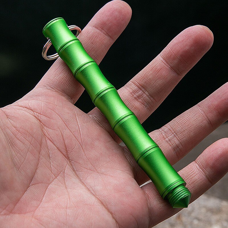 The Bamboo Portable Knife being used to cut a rope, showcasing its sharpness