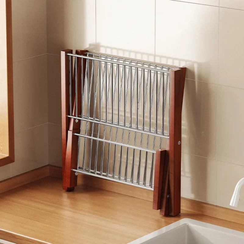 Swift Fold Collapsible Dish Drying Rack holding various dishes and cups