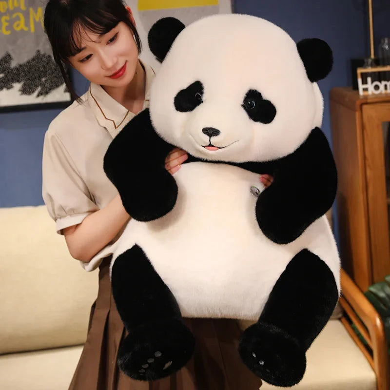 Jumbo Panda Plush on a Bed