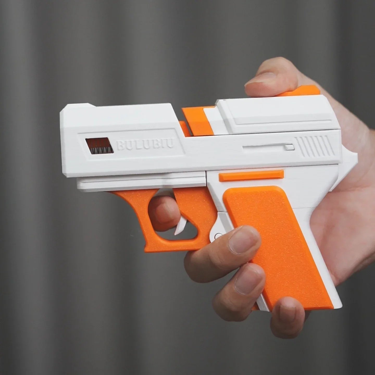 Multiple views of the gun-shape AirPods protective case