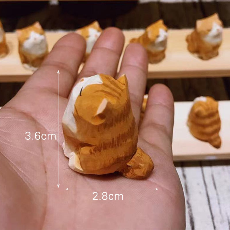 A collection of handmade wooden pet figurines as a creative gift idea