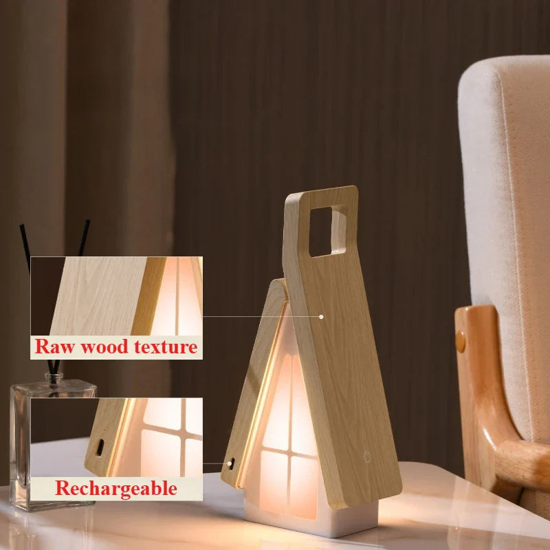House-shaped lamp as a decorative object on a modern bookshelf