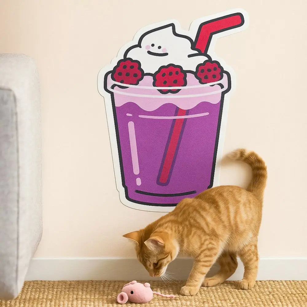 Close-up of a cat using the playful drink-shaped scratching board