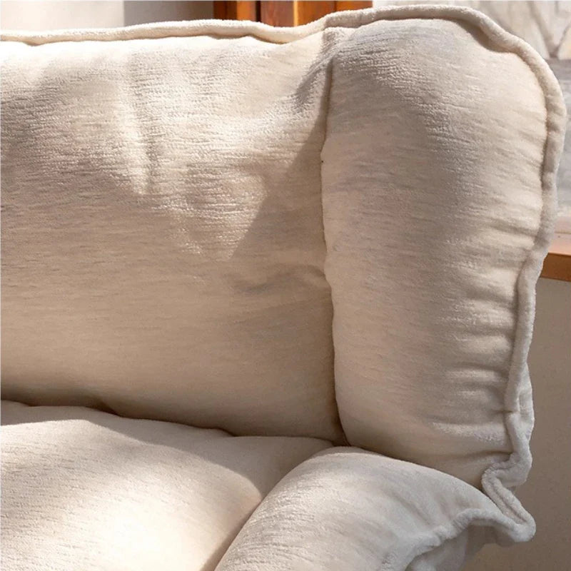 Detailed view of the floor recliner's fabric and construction