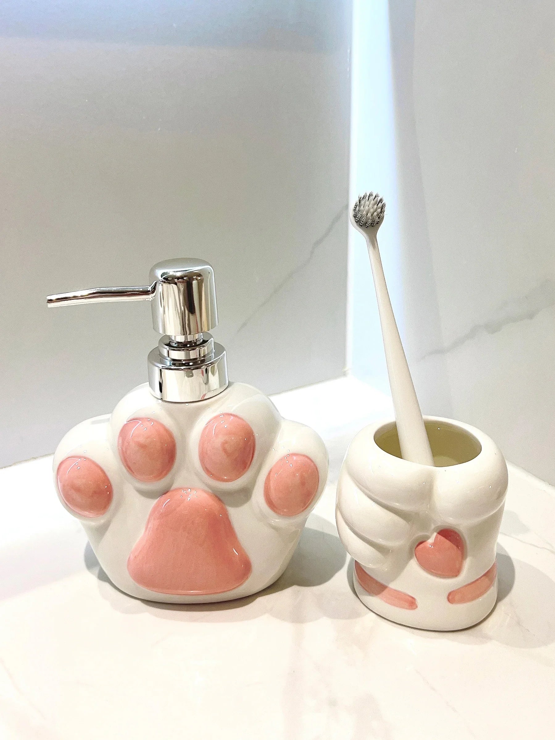 Using the Little Paw Soap Dispenser in a modern bathroom