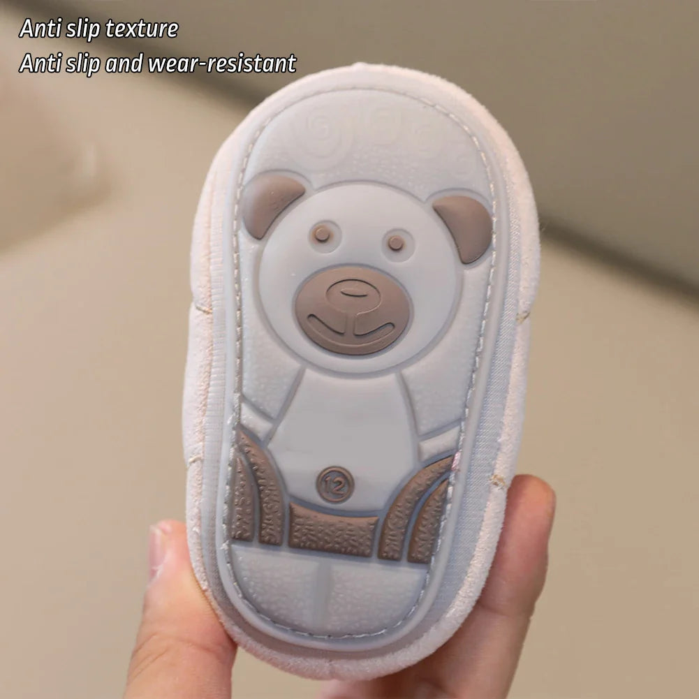 Adorable baby wearing the soft sole shoes