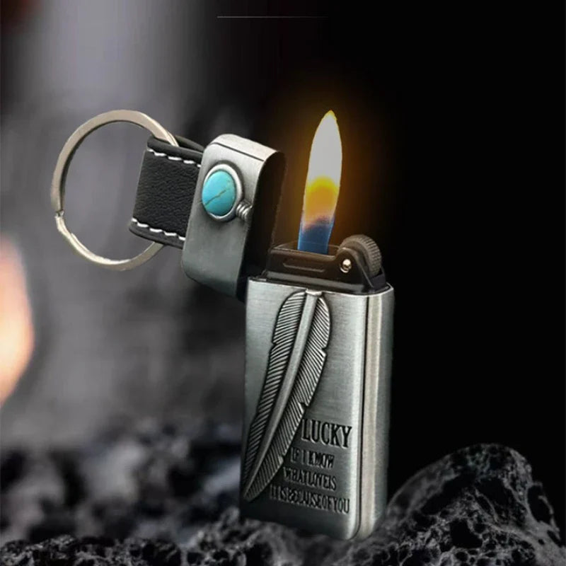 Close-up of the vintage feather engraving on the metal lighter