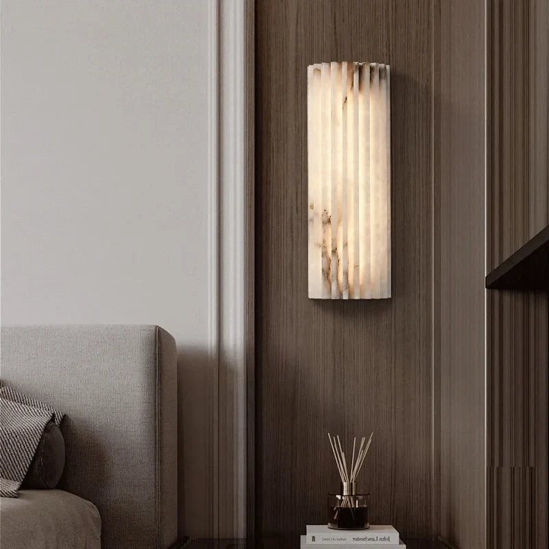 Ambient glow from the marble texture wall light in a home