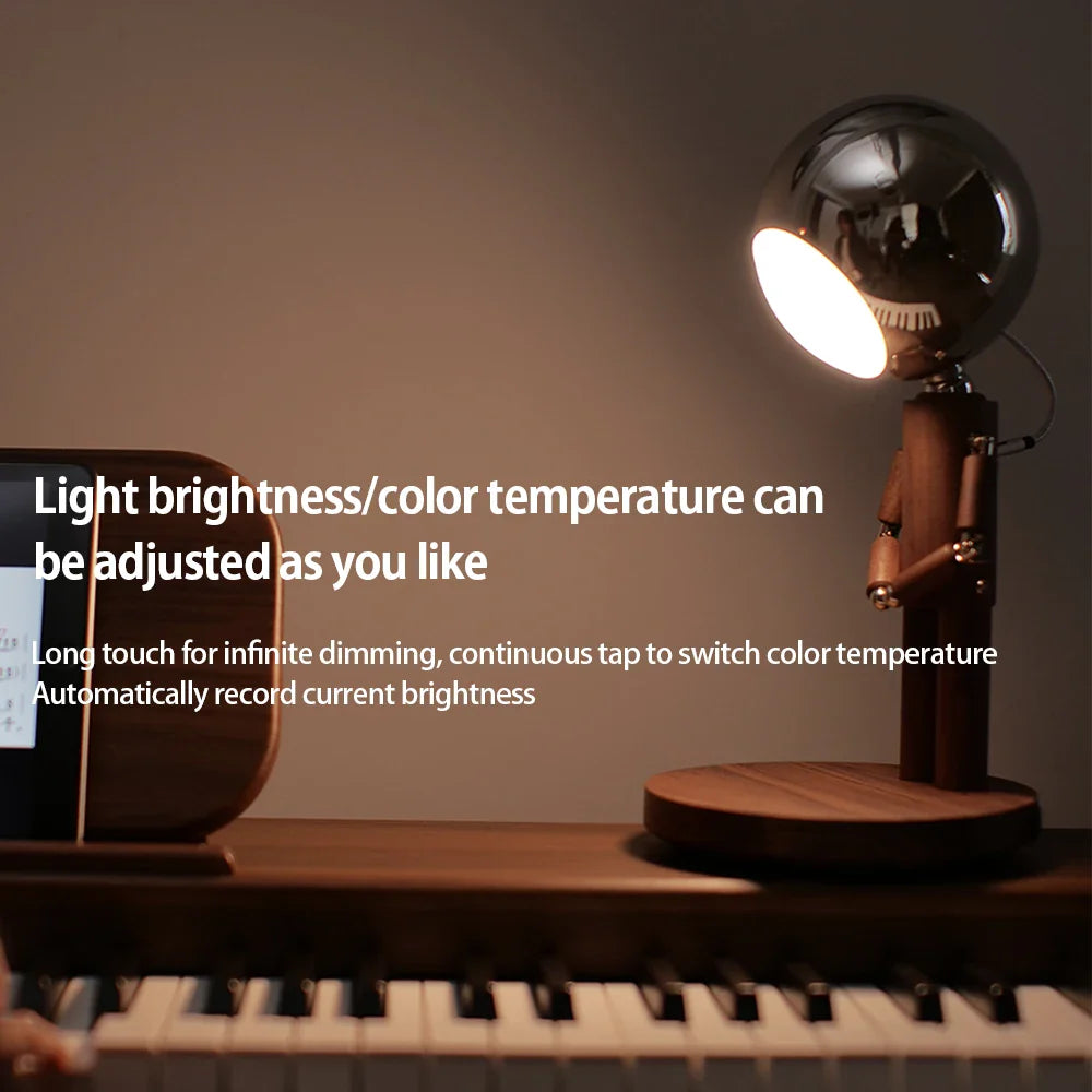 Lunar Robot lamp providing warm ambient light in a bedroom