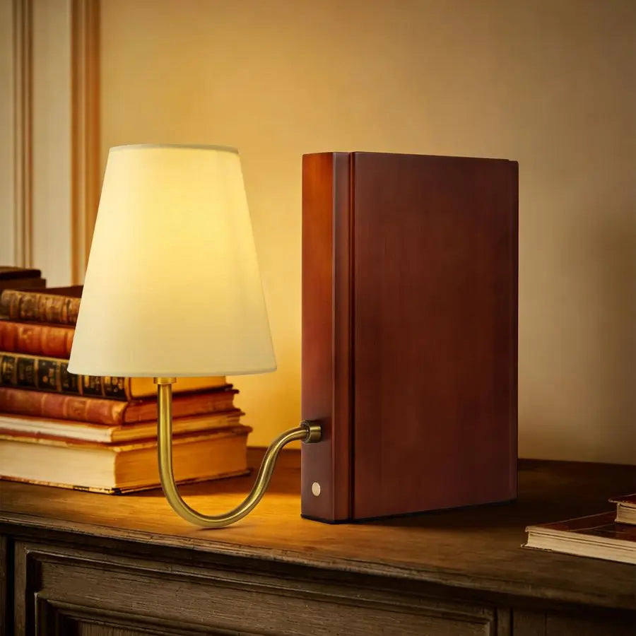 The book lamp providing warm ambient light in a modern living room