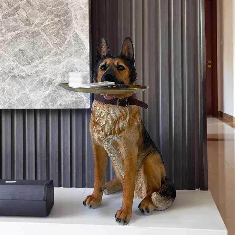 Close-up detail of the German Shepherd sculpture's face on the side table.