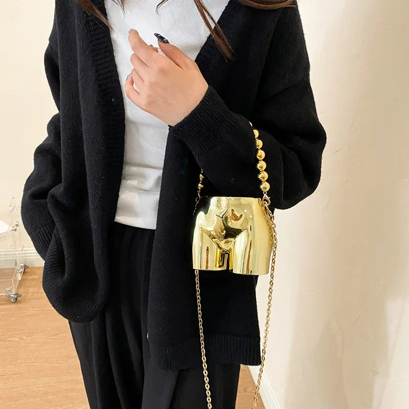 Woman wearing the mini shoulder bag as a stylish crossbody accessory