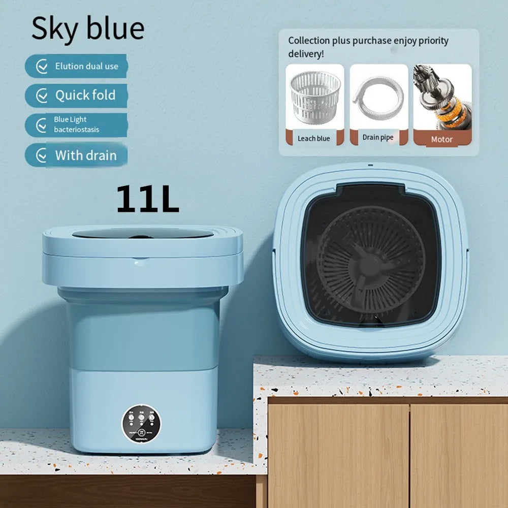 Blue portable washing machine being used for baby clothes
