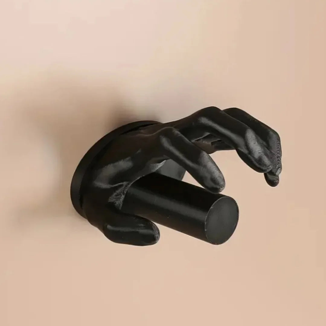 The Witch Hand Toilet Paper Holder in a modern bathroom setting
