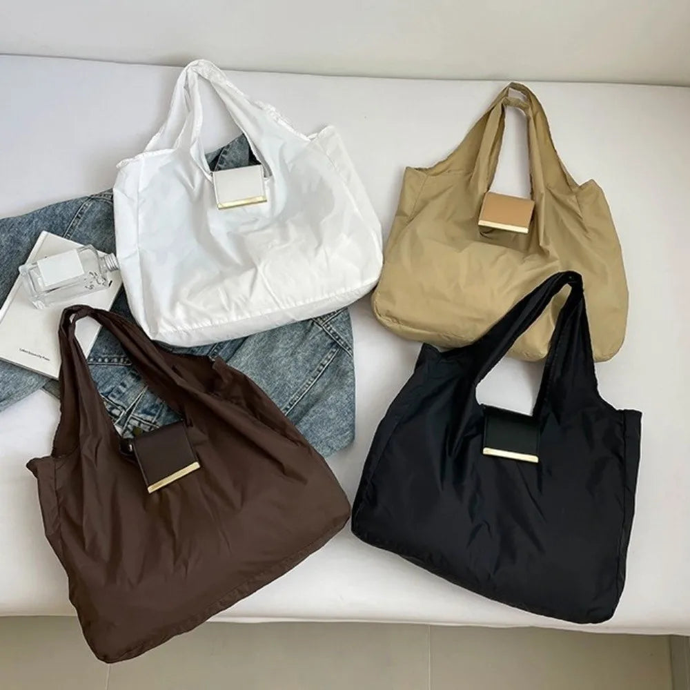 Woman carrying the expanded tote bag while shopping