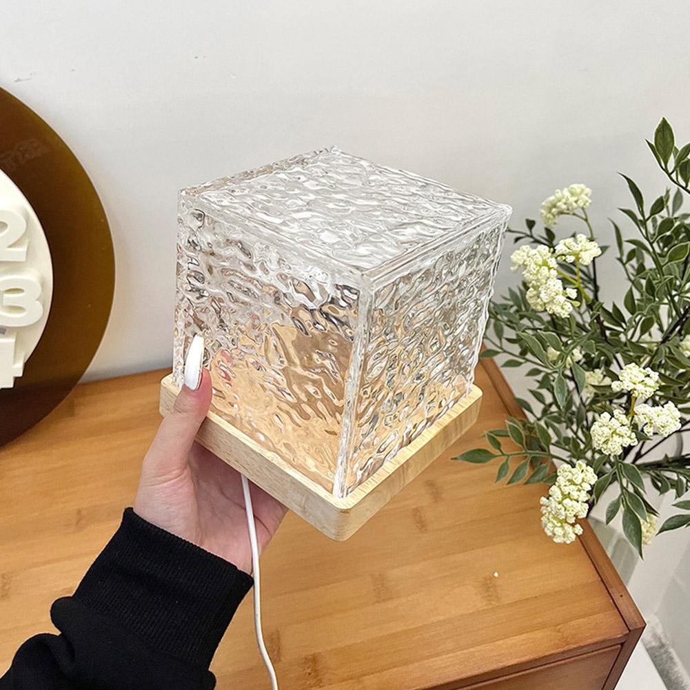 Shining Diamond Table Night Lamp casting a colorful glow on a surface