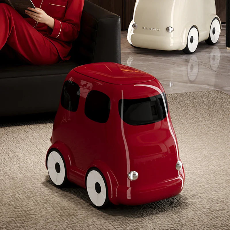 Child riding the fun ride-on toy storage bin in a living room