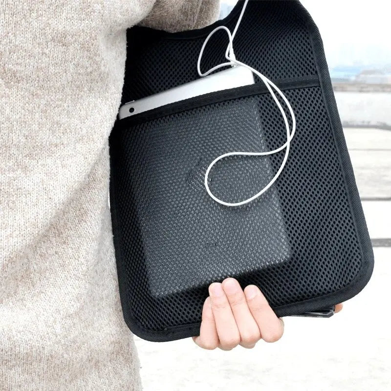 Close-up of the underarm bag's adjustable strap and secure fit